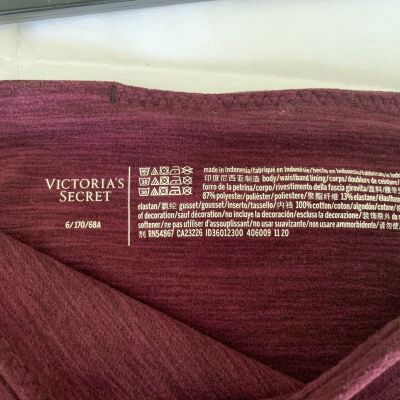 Victoria’s Secret Burgundy workout leggings with side Pockets Size 6