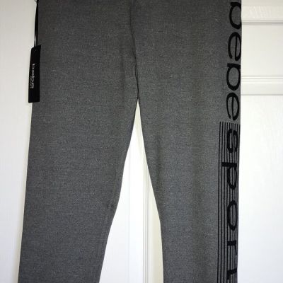 Bebe sport  Womens leggings Capri Grey/black Size 1X NWT